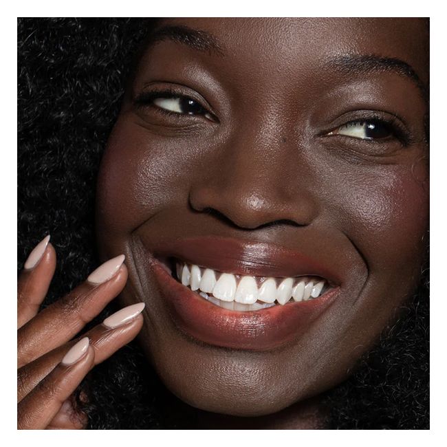 Ilia's Wanderlust Balmy Tint tinted lip balm Model