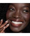 Ilia's Wanderlust Balmy Tint tinted lip balm Model