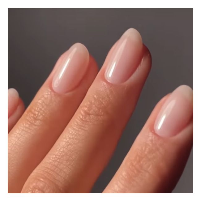 Kure Bazaar's Pink Glow Nail Polish Application