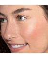 Ilia Beauty's Liquid Light Serum Highlighter Astrid Model
