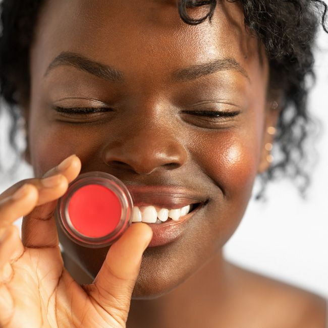 Ere Perez's Carrot Colour Pot Hello Organic tinted balm Model