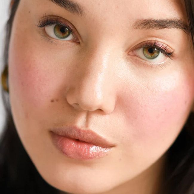 Ere Perez lip gloss Mango Lip Honey Chili model