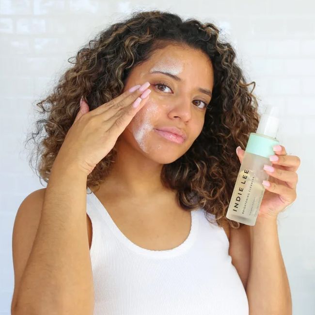 Indie Lee brightening cleanser model