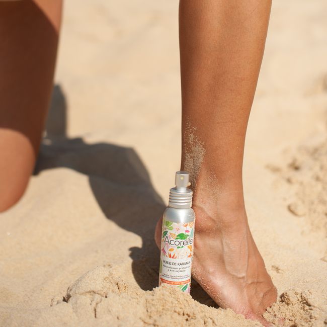 Acorelle's Karanja Organic sunscreen oil lifestyle