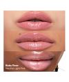 Kosas' Wet Stick baby rose tinted lip balm models
