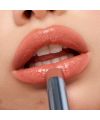 Kosas' Wet Stick papaya treat tinted lip balm lifestyle