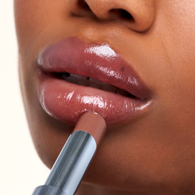 Kosas' Wet Stick 100 degrees tinted lip balm lifestyle
