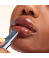 Kosas' Wet Stick sunset simmer tinted lip balm lifestyle