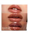 Kosas' Wet Stick sunset simmer tinted lip balm models