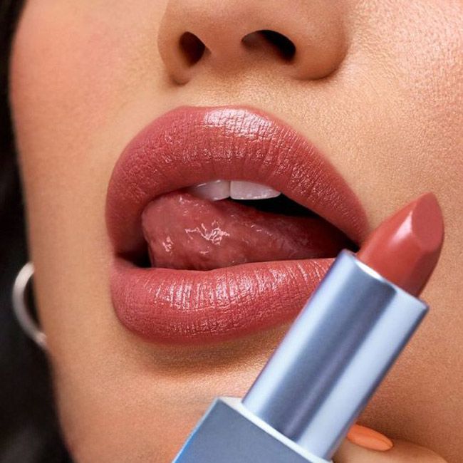 Kosas' turned on  Weightless Lip Color Natural Lipstick makeup