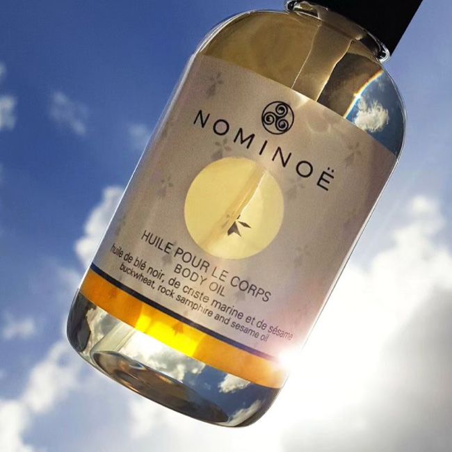 Nominoe cosmetiques' nourishing body oil packs lifestyle