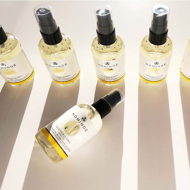 Nominoe cosmetiques' nourishing body oil packaging lifestyle
