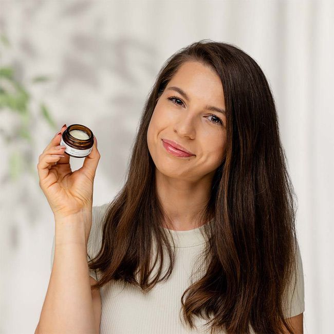 Evolve Beauty's conditioned lip balm model