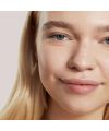 Ilia Beauty's SC . 25 Mallow True Skin natural Serum Concealer Model