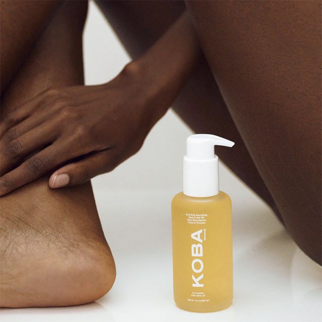 Koba Skincare's Gold Drip nourishing hair and body oil Model