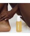 Koba Skincare's Gold Drip nourishing hair and body oil Model