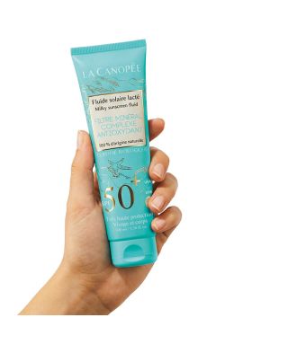 Fluide solaire lacté SPF50+